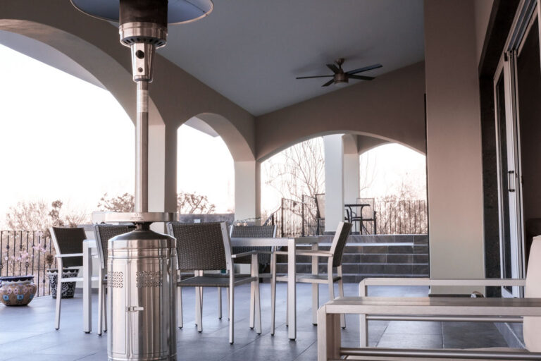 empty tables and chairs on a patio representing the loss and drift away from initial excitement.